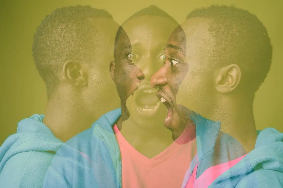 A triple-exposure portrait of a person against a yellow background